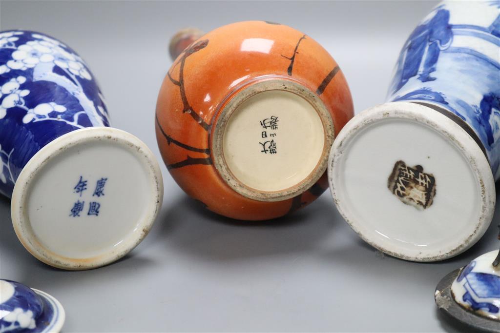 A Satsuma vase, 34cm, and two Chinese blue and white porcelain baluster jars and covers, all late 19th/early 20th century